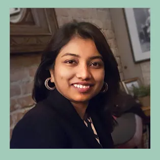 Portrait of Nazia Habib smiling at the camera. Photo.